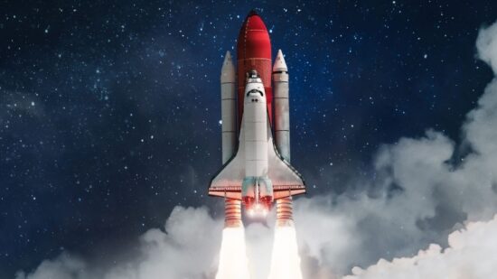 Space shuttle rocket launch in the clouds with stars to outer space-Shutterstock_2057170763